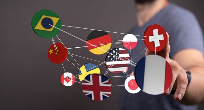 Person interacting with a network of international flags representing global connections, communication, and collaboration across borders. The i