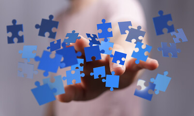 Hand holding puzzle pieces, teamwork, collaboration and problem solving concept. Digital illustration of 3D render puzzle pieces, business, crea