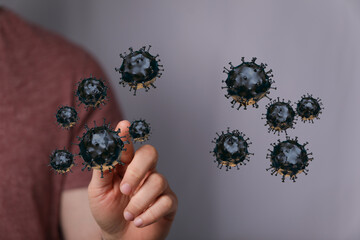 Abstract conceptual image depicting the spread and control of a virus. Hand interacting with digitally rendere