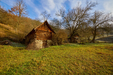 landscape with old wooden houses in the mountains in the Banat area of ​​Romania