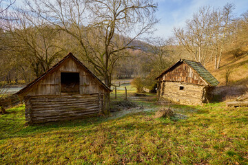 landscape with old wooden houses in the mountains in the Banat area of ​​Romania