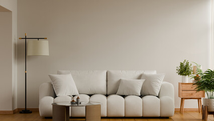 Minimalist living room mockup featuring a white plush sofa and elegant floor lamp in the soft cloud dancer 2026 hue- 3D rendering