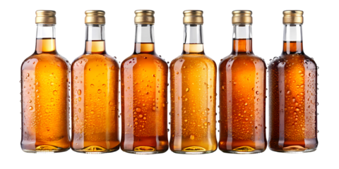 A row of six cool glass bottles with golden amber liquid and refreshing condensation