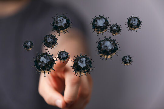 Hand interacting with coronavirus cells. Representing pandemic, virus, disease spread, healthcare, and global