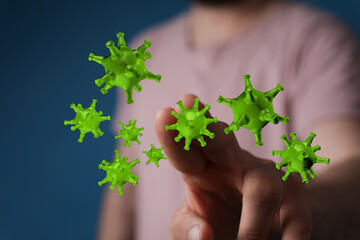 Hand pointing at viruses. Illustrative image about virus and prevention. Medical illustration for...
