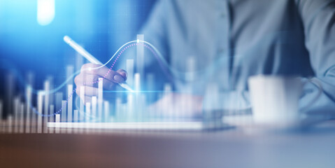 Interactive Data Visualization and Business Analytics Interface Projected on Virtual Screen.