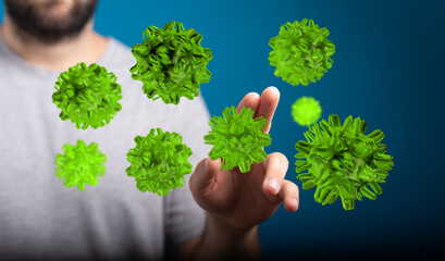 Conceptual image of a man touching floating virus particles, representing health, disease, and the spread of i