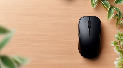 Minimal workspace with black wireless computer mouse on wooden desk, green plants and large copy space, representing office setup, productivity, remote work and clean design