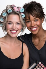 a woman with her hair in curlers is getting her makeup done by a professional makeup artist.