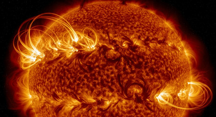Close-up of sun's fiery surface, intense orange and yellow hues, showcasing solar flares and magnetic loops, representing power, energy, and cosmic phenomena