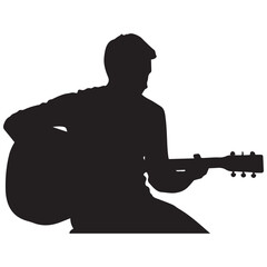 Silhouette of a man playing acoustic guitar