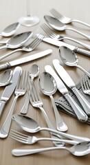 Elegant Silverware Set on Table.