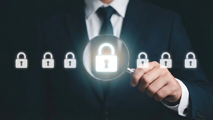 A businessman utilizes a magnifying glass to focus on a highlighted padlock among a series of locked icons symbolizing data security and protection
