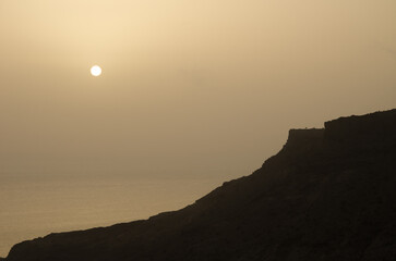 Sunset at the mouth of the Veneguera ravine. Mogan. Gran Canaria. Canary Islands. spain.