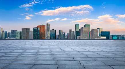 Empty square floor and modern city skyline with office buildings scenery in Hangzhou