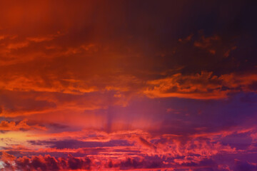 Obraz premium Beautiful sunset sky above clouds with dramatic light. Cabin view from airplane