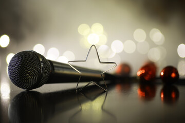 Microphone with Star Ornament and Lights in Background - Festive Concert Stage Close-Up