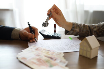 Businessman giving money, Russian Ruble currency, to hs partner - payment, loan and bribery concept