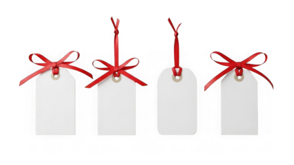 Four white gift tags with red ribbons on transparent background isolated