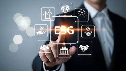 Businessman interacting with esg icons on a digital interface for sustainability and corporate responsibility