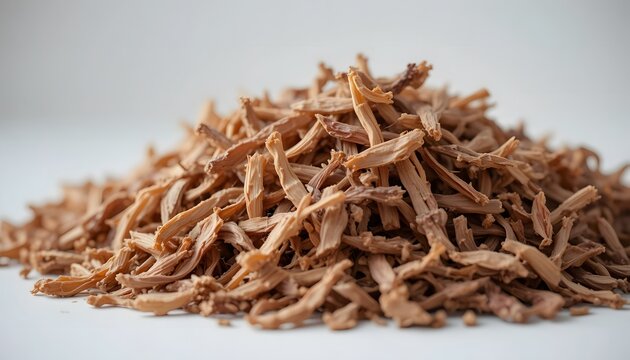 A pile of dried shatavari root pieces, a traditional herbal ingredient with health benefits. beet pulp