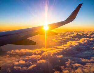 Fototapeta premium Aerial view from a plane window showing the wing against a vibrant sunrise. The sun bursts through fluffy clouds