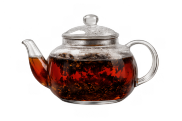Glass teapot brewing black tea, showing floating dry tea leaves in hot infusion for a transparent tea time beverage