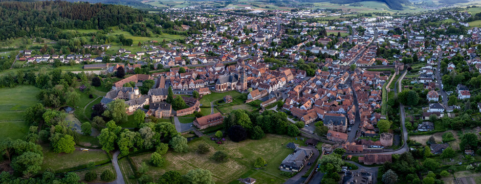 Aerial panoramic view of the city and castle B&uuml;dingen, 63654 in Germany on a sunny spring afternoon.
