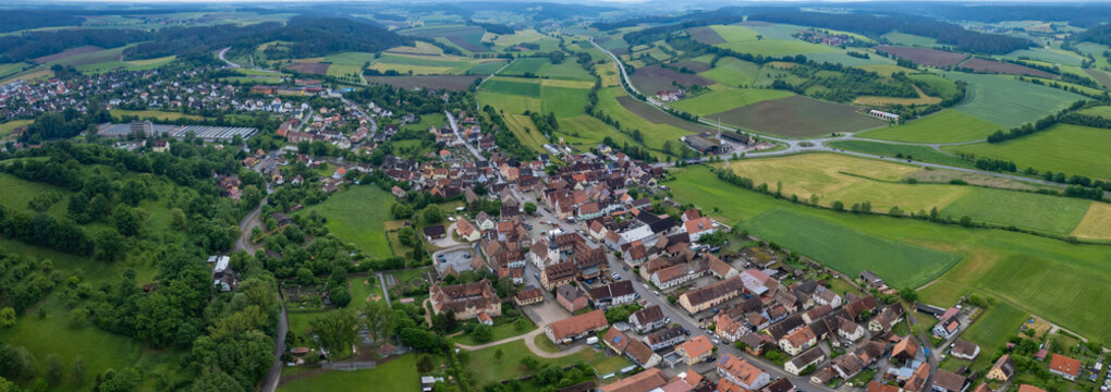 Aerial panoramic view of the city Neuhof an der Zenn in Germany, Bavaria on a sunny spring noon.