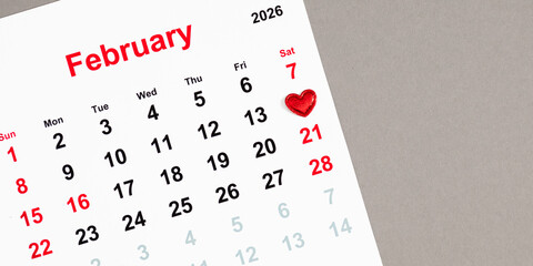 A calendar for February 2026, with the date February 14th marked with a red heart symbol, representing Valentine's Day.