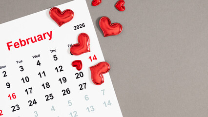 Red hearts frame the calendar, highlighting February 14, 2026, as the most special day of love. Elegant design conveys tenderness and passion of this romantic holiday.