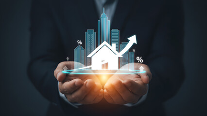 Businessman holding glowing digital projection of a rising house value with city skyscrapers and growth statistics