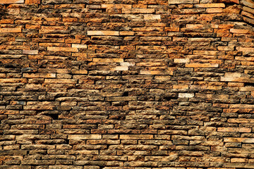 Textured Stone Wall with Earthy Tones and Natural Patterns