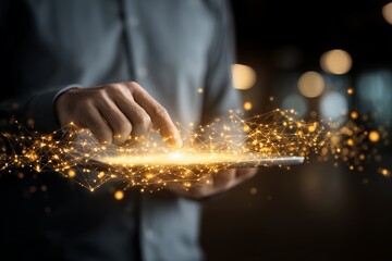 Executive's hand touching tablet screen, generating glowing golden digital network visualization, concept for digital transformation, data management and global communication