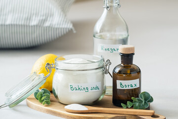 Natural eco-friendly pillow cleaning concept using baking soda, vinegar, salt and borax. Sustainable, non-toxic home care solution for fresh and hygienic bedding. Zero waste concept.