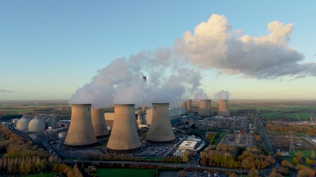 Aerial view of large power station in countryside