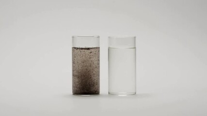 Medium Shot of Glasses of Dirty and Clean Water, Clear Comparison of Water Pollution and Purification, Environmental Awareness and Safe Drinking Water Concept, Sustainability and Hygiene Education Vis