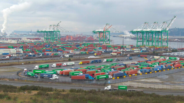 DRONE: Dark stormy clouds gather above the colorful harbor in Los Angeles.