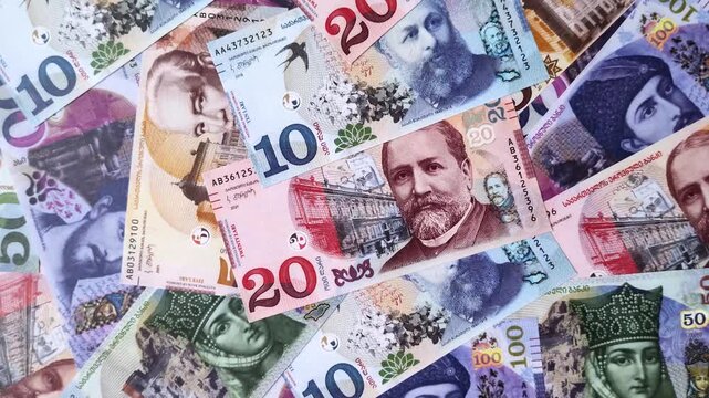 Georgia money, the georgian lari currency, banknotes of various denominations, financial transactions. Georgian money, the lari as a financial background for your design