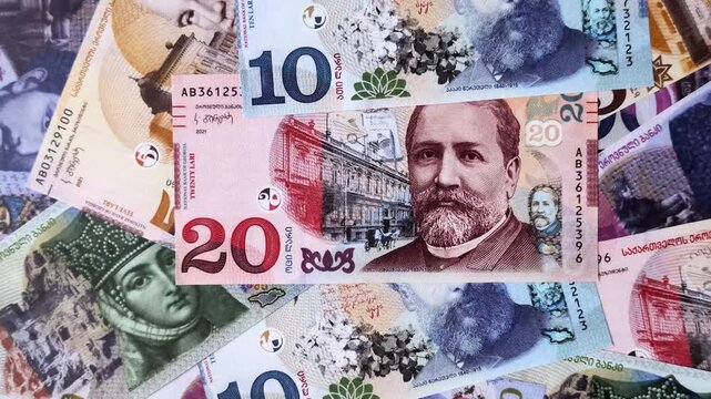 Georgia money, the georgian lari currency, banknotes of various denominations, financial transactions. Georgian money, the lari as a financial background for your design
