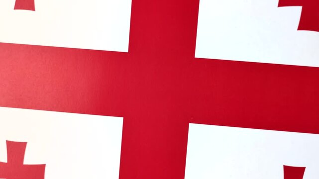 Georgia, the Georgian red and white flag as a symbol of independence and freedom. The Georgian flag as a background for your design