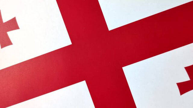 Georgia, the Georgian red and white flag as a symbol of independence and freedom. The Georgian flag as a background for your design