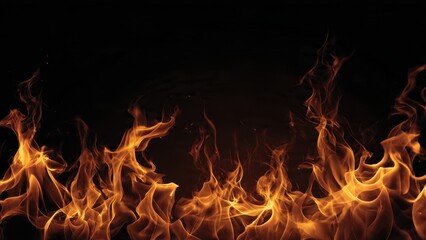 Detailed closeup of vibrant flowing fire flames isolated on a deep black background providing heat energy and dynamic texture for design overlays or backgrounds