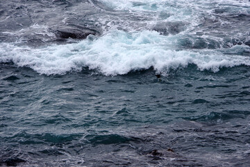 Ocean surf waves at the central California coast in winter