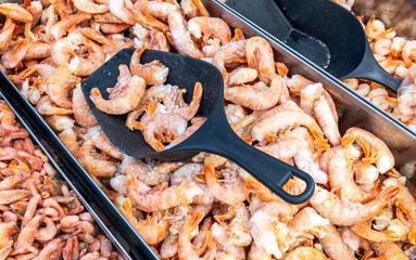 Frozen shrimp are sold in the grocery store