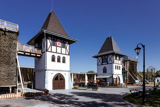 Inowroclaw, Poland - October 8, 2021. Brine graduation towers in Park Solankowy ("Brine Park") on a sunny day in autumn. Inowroclaw is a spa town located in central Poland.