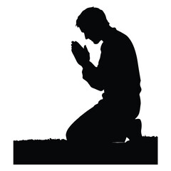 Man kneeling in prayer on grassy field viewed from the side