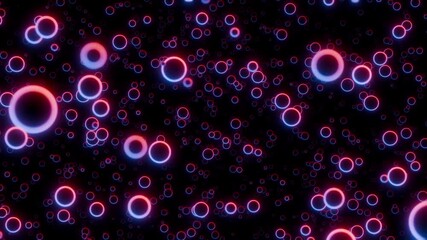 Seamlessly looped animation of moving through abstract field of glowing neon circles in dark space. Futuristic digital background with red blue luminous rings in sci-fi technology style. Loop 4K 60fps