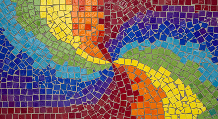 Close-up of a vibrant, colorful mosaic composed of small, square tiles arranged in a radiating, rainbow-like pattern