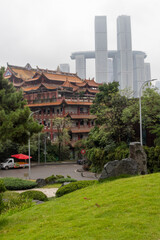 Qianfosi with Raffle City in background in Chongqing, China.